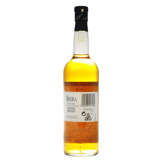 Brora 30 Release Year Old 2017 Special Release bottle showcasing its pale straw gold hue and classic minimalist cream label next to its presentation box set upon an alpine winter landscape.