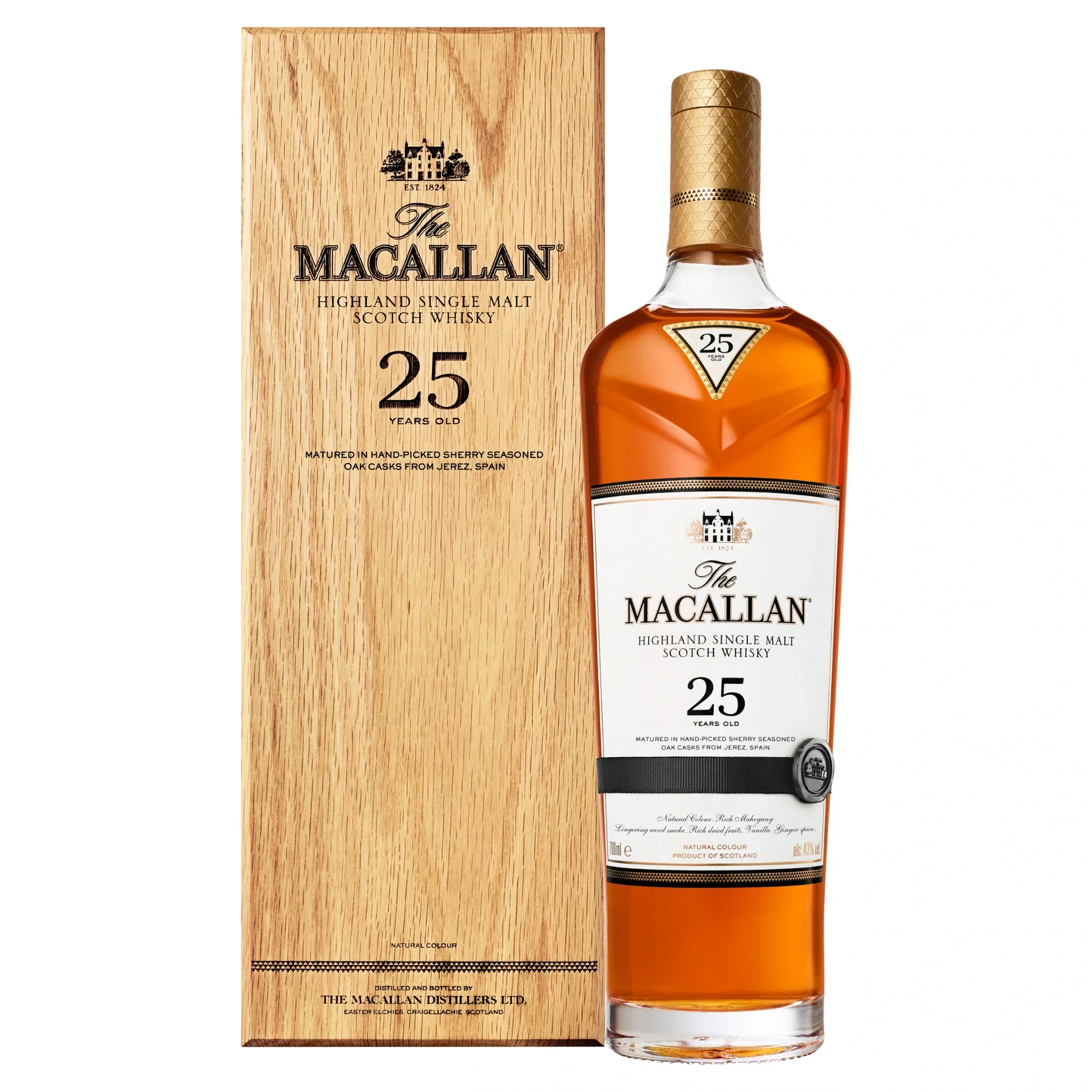 The Macallan 25 Richness Sherry Oak single malt Scotch whisky bottle displaying its natural dark amber color and white label, standing next to its premium open solid oak display box and outer protective cardboard carton.