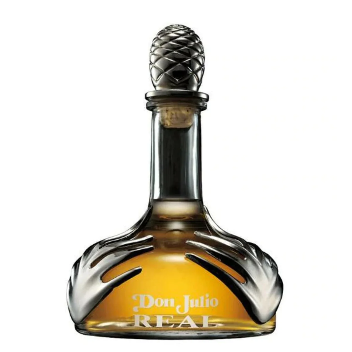 Don Julio Real Extra Anejo Tequila iconic wide glass decanter wrapped in platinum-plated agave leaves next to its deep teal presentation case.