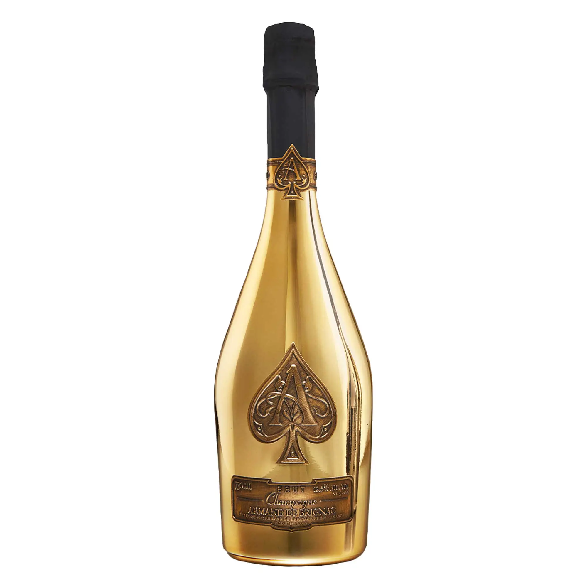 Brignac Gold Brut iconic luxury prestige champagne bottle showing its magnificent mirror finish yellow gold plating next to its heavy black piano lacquered wooden presentation case.