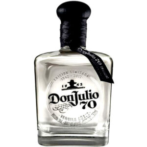Don Julio 70 Cristalino Anejo Tequila iconic stout square clear glass bottle showing its transparent diamond liquid next to its matte black presentation box.