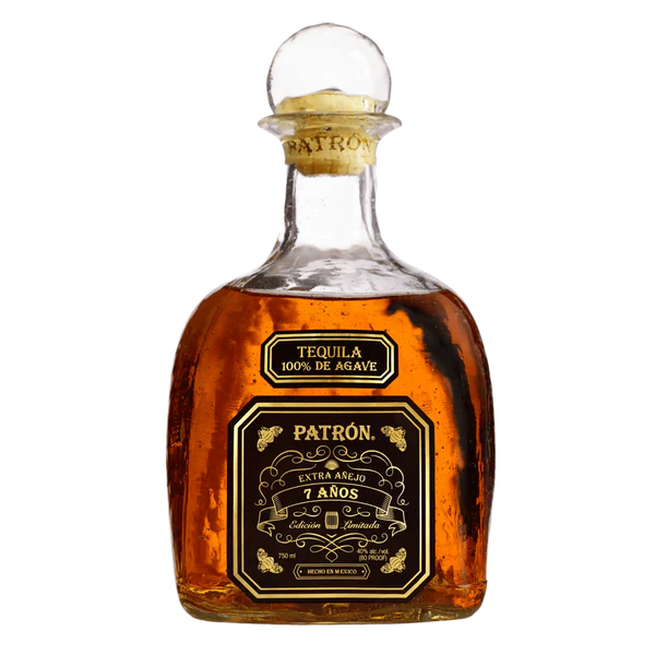 Patron Extra Anejo 10 Years Tequila limited edition crystalline decanter showing its dark mahogany liquid, featuring an elegant blue front label with gold accents.